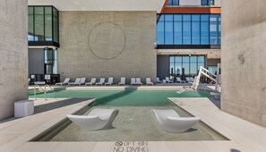 Outdoor pool, pool umbrellas, pool loungers