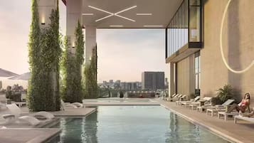 Outdoor pool, pool umbrellas, pool loungers