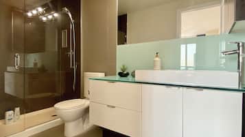 Shower, hair dryer, towels, shampoo