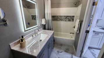 Hair dryer, towels, soap, toilet paper