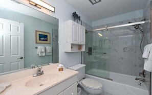 Shower, hair dryer, towels