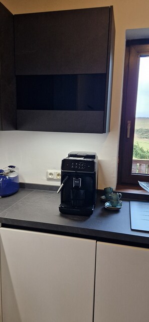 Piano cottura, lavastoviglie, carta assorbente