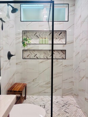 Shower, hair dryer, towels, soap