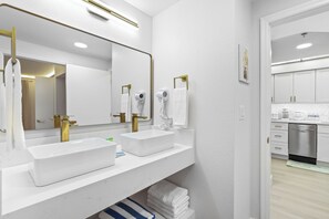 Hair dryer, towels, soap, toilet paper