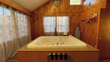 Shower, jetted bath, towels