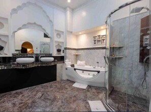 Deluxe Suite | Bathroom | Separate bathtub and shower, hair dryer, towels, soap - Riad Palais Didier Six  (Marrakesh)
