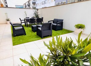 Standard-huoneisto, lanai | Ulkoruokailutilat