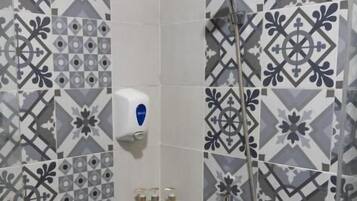 Suite, Pool View | Bathroom | Shower, hair dryer, towels