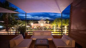 Suite, Balcony, Pool View | Property grounds