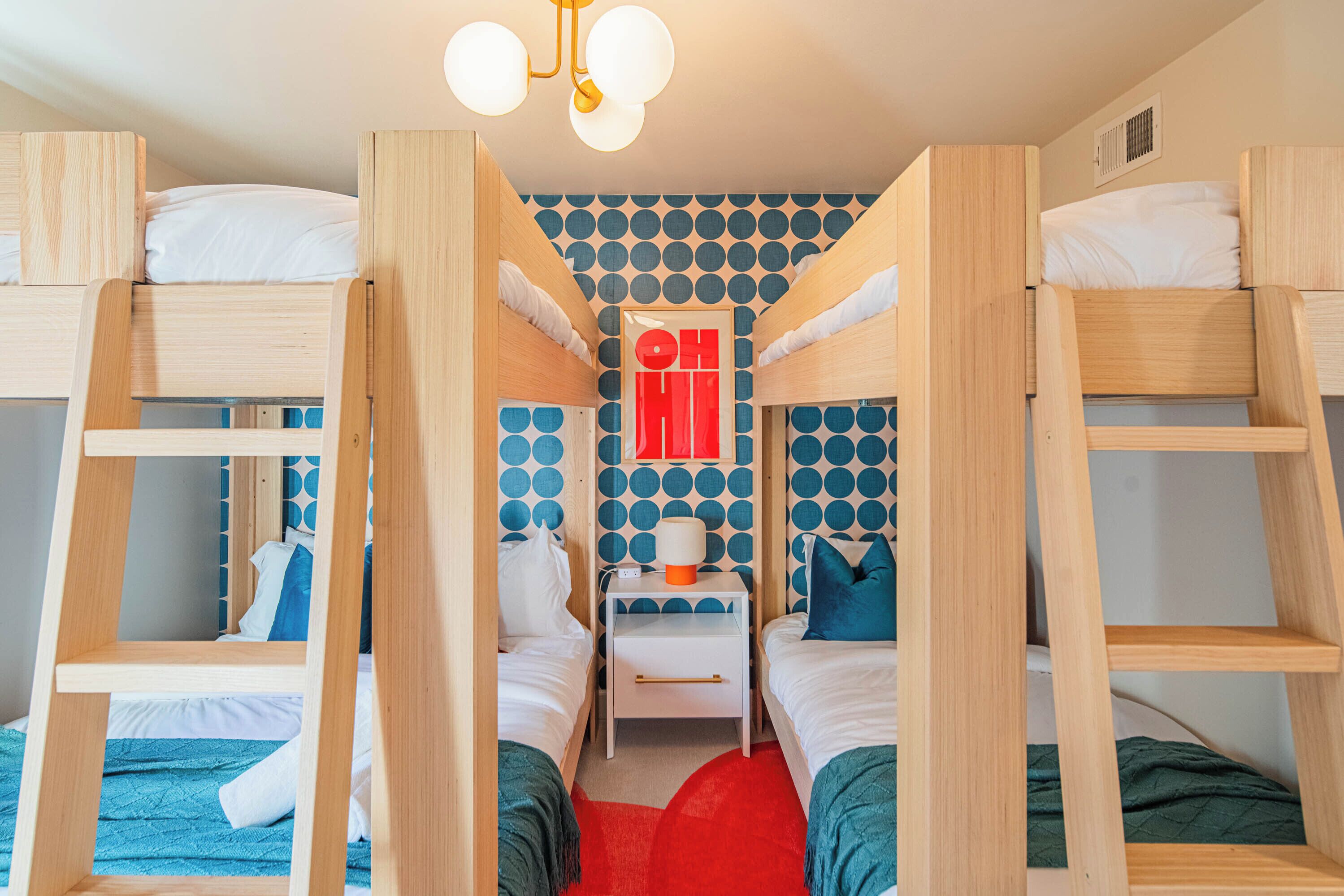 Fun and functional bunk room with multiple beds — ideal for kids, teens, or group trips looking to maximize sleeping space.