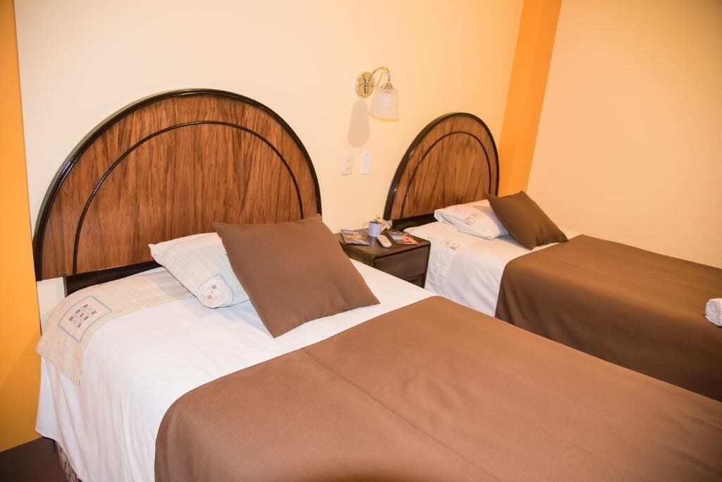 غرفة مزدوجة أو بسريرين منفصلين بتجهيزات أساسية | واي فاي مجانًا