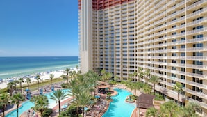 A high-rise hotel with a pool area, beach access, and a view of the ocean. - Come Visit Sophomore! 2BR 2BA Beachfront Condo! (Panama City Beach)