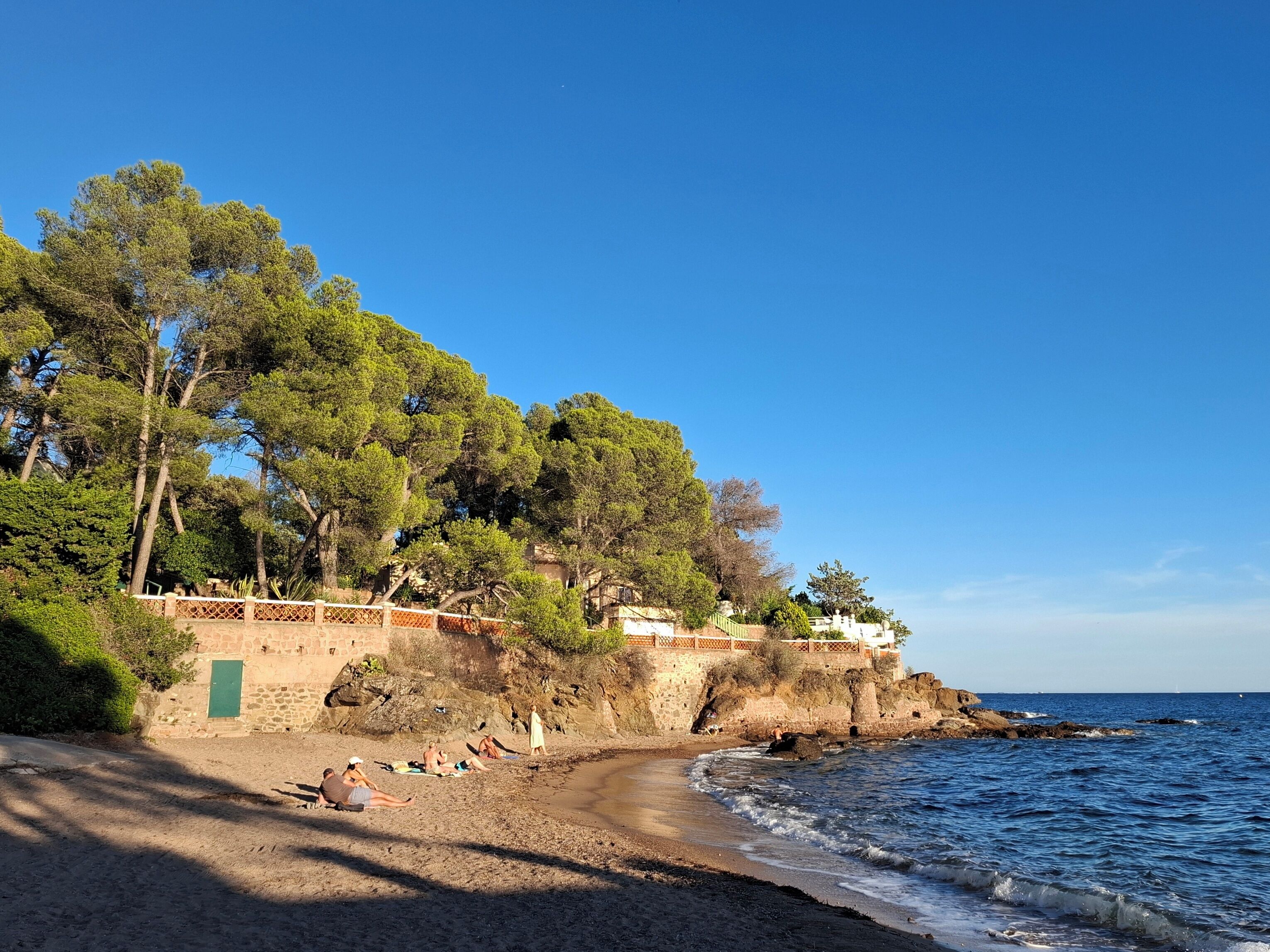 On the beach, sun loungers, beach towels