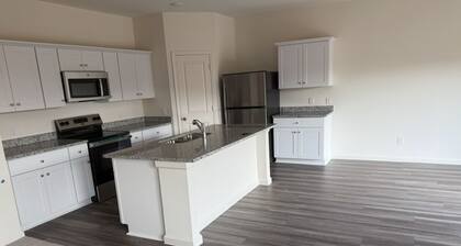 Spacious 4-bedroom house in charming Houston with AC and fitness room