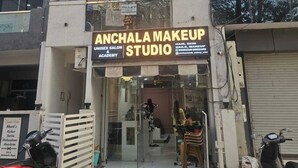 A building with a storefront named "Anchal Makeup Studio" offering services like hair, skin, and nail care. - Cozy 1-bedroom fabulous studio in Indore with all amenities. (Indore)