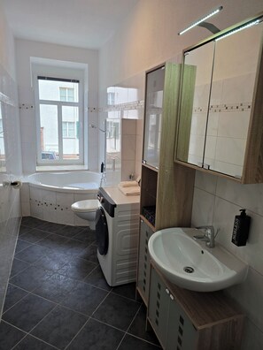 Hair dryer, towels, soap, shampoo