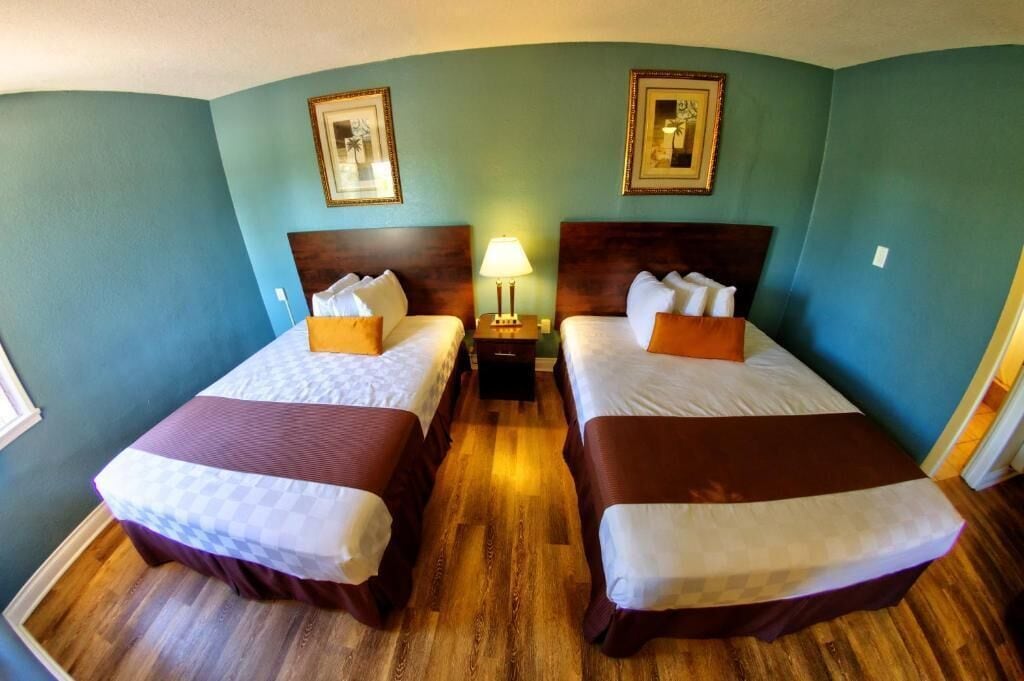 Room, 2 Queen Beds, Garden View | Desk, free WiFi