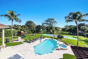 A swimming pool with a hot tub, a children's play area, and a tennis court. - Villa w/pool, games & BBQ (Coral Springs)