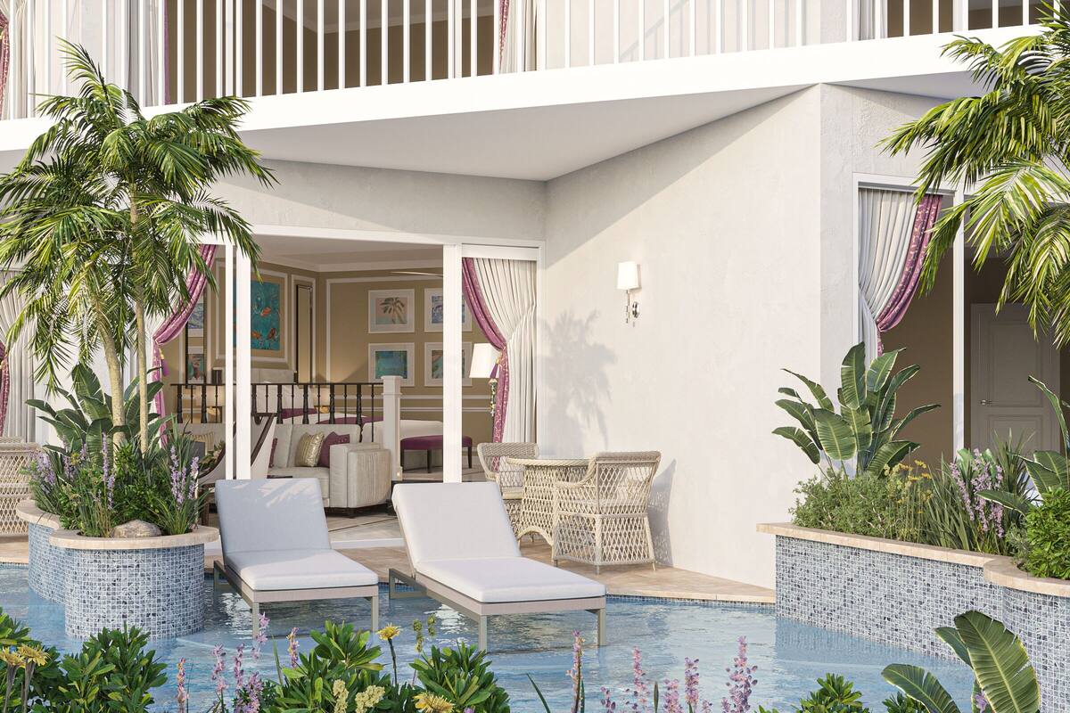 A poolside area with lounge chairs, a dining set, and potted plants.