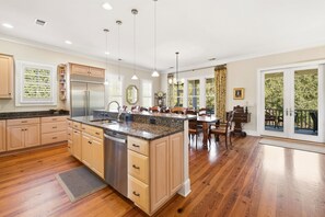 Fridge, microwave, oven, stovetop - 5BR/6BA Coastal Retreat with Elevator, Screened Porches & Easy Beach Access (Georgetown)