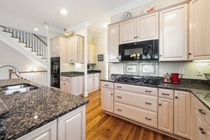 Fridge, microwave, oven, stovetop - 5BR/6BA Coastal Retreat with Elevator, Screened Porches & Easy Beach Access (Georgetown)
