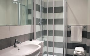 Hair dryer, towels, toilet paper