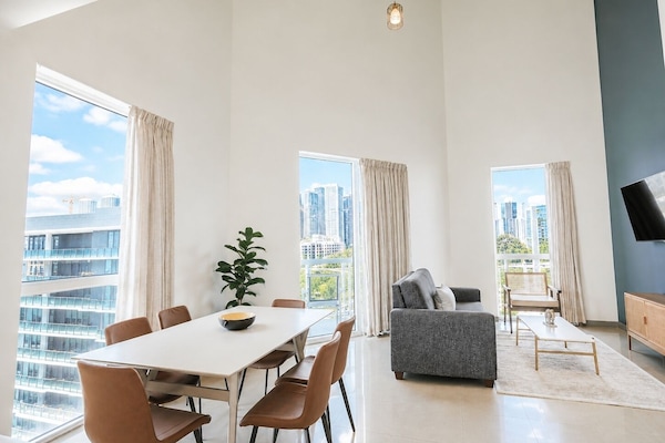 Signature Penthouse, 3 Bedrooms | Living area | 55-inch Smart TV with satellite channels