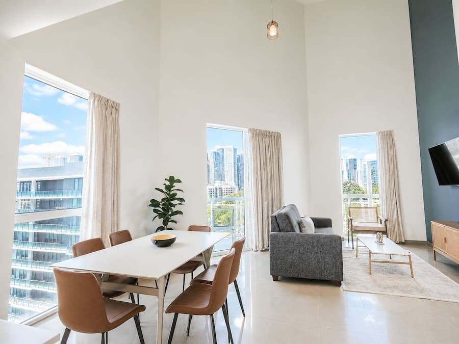 Signature Penthouse, 3 Bedrooms | Living area | 55-inch Smart TV with satellite channels