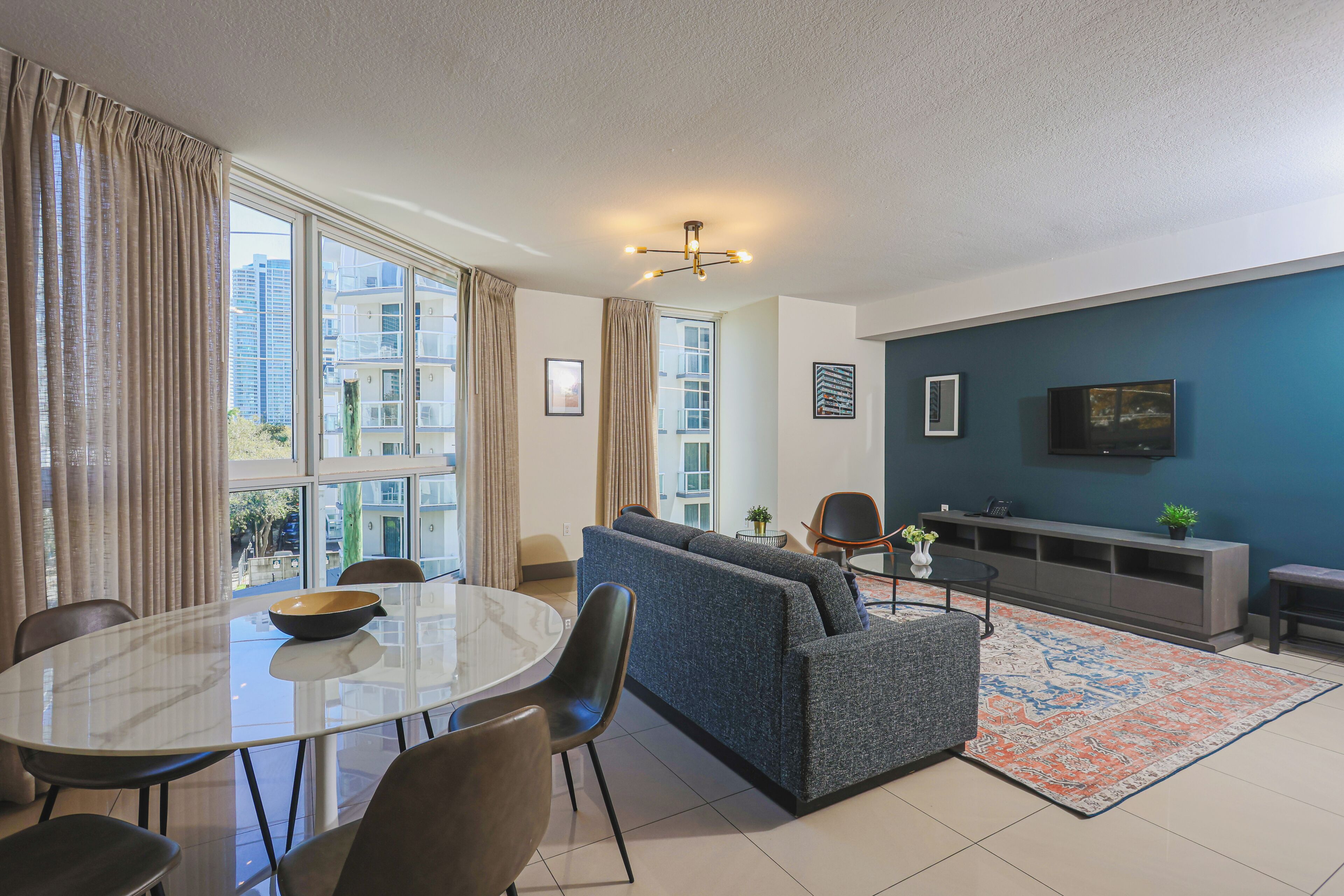 Classic Apartment, 2 Bedrooms | Living area | 55-inch Smart TV with satellite channels