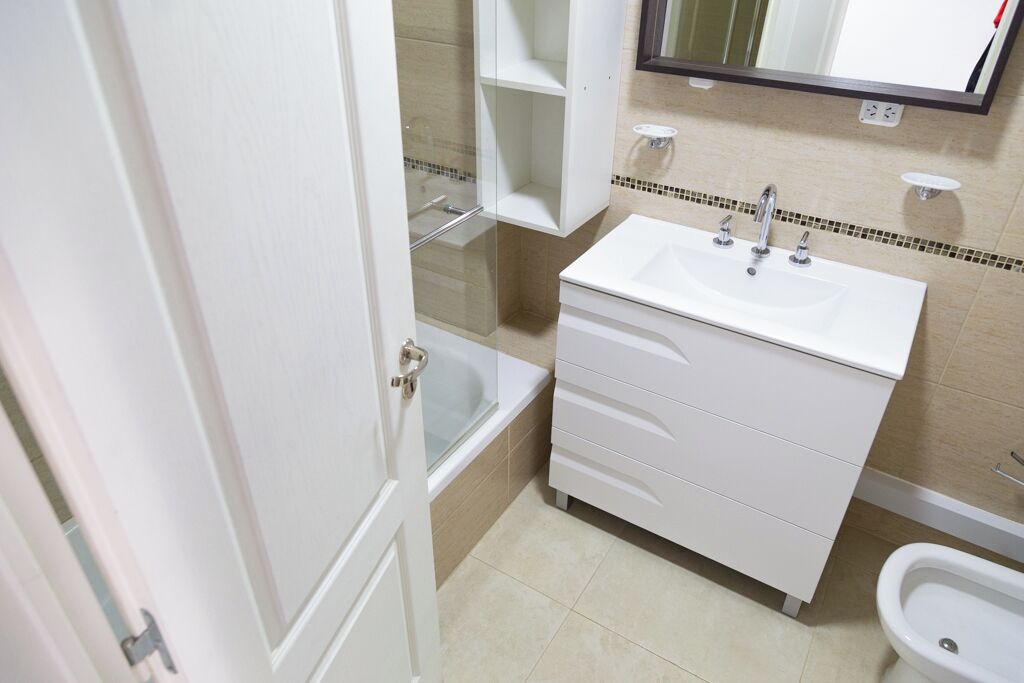 Hair dryer, bidet, towels, soap