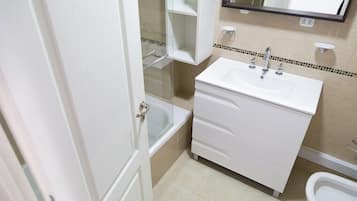 Hair dryer, bidet, towels, soap