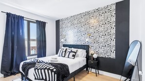 1 slaapkamer, een strijkplank/strijkijzer, wifi, beddengoed