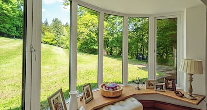 A Sanctuary in the Surrey Hills, surrounded by Serene Private Woods & Parkland