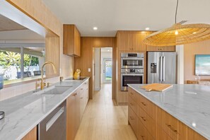 Fridge, microwave, oven, stovetop - The Beach Treehouse: Canal, Dock, Pool, Treehouse by Anna Maria Life (Anna Maria)