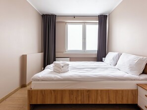 Fer et planche à repasser, draps fournis