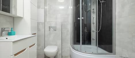Shower, free toiletries, hair dryer, towels