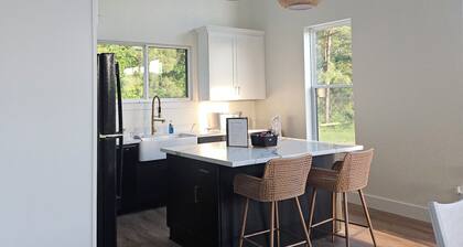 Luxury cottage with amazing forest view minutes from Lakes, trails and more!