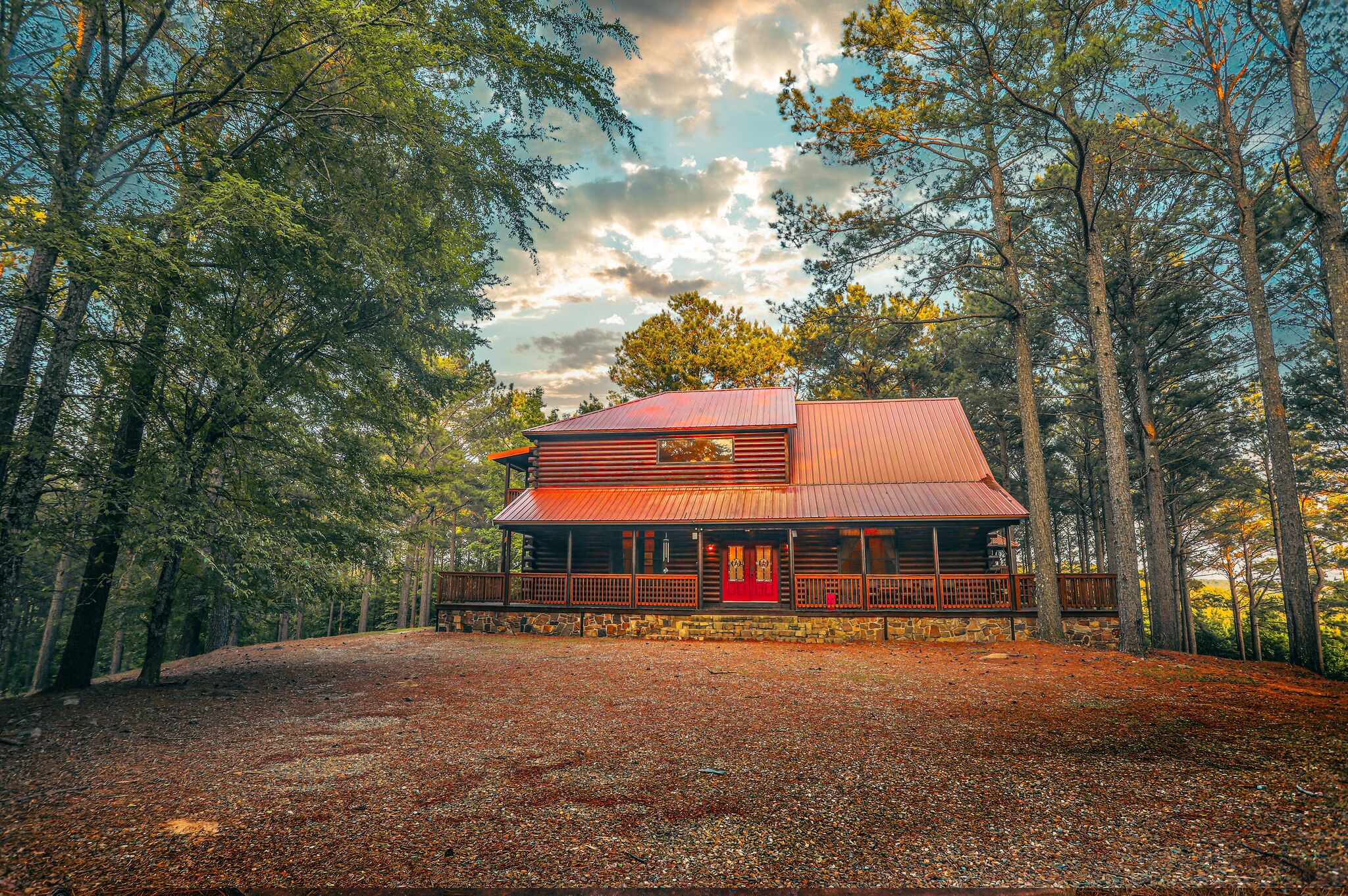 Stunning log cabin retreat nestled among tall pines in Broken Bow