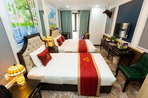 A hotel room with two beds, a desk, a television, and a large window with curtains. - Collection O Havana Airport Hotel (Ho Chi Minh City)