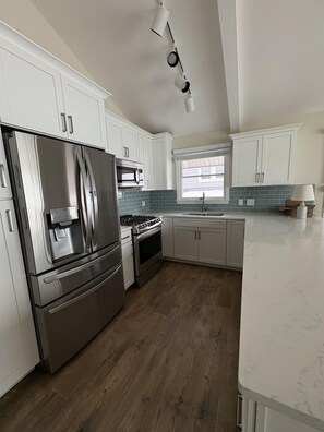 Fridge, microwave, oven, stovetop - Luxury Lakefront Living | New vacation rental (Spring Lake)
