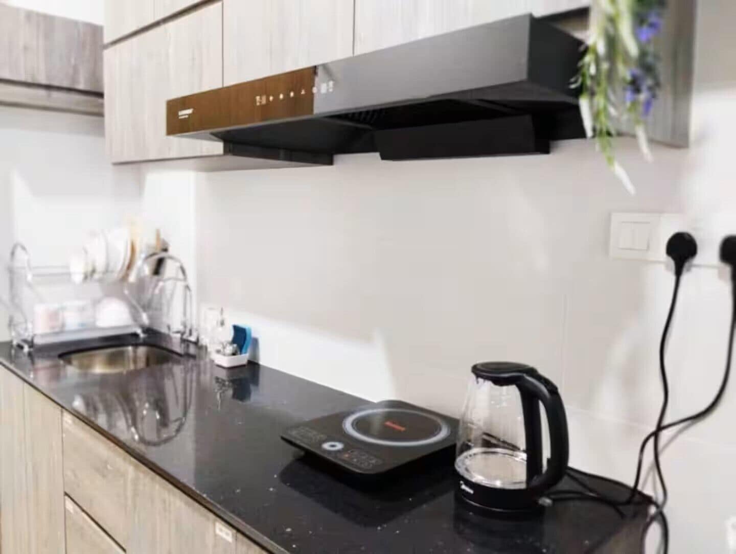 Fridge, stovetop, electric kettle, cookware/dishes/utensils