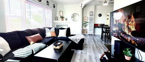 Smart TV, foosball, music library, stereo