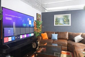Living area - Ambient studio with huge TV and Pool (Johannesburg)