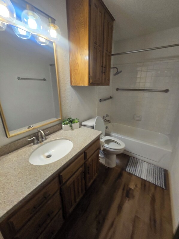 Shower, towels, soap, toilet paper