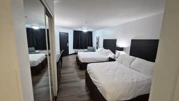 Desk, laptop workspace, blackout curtains, free WiFi