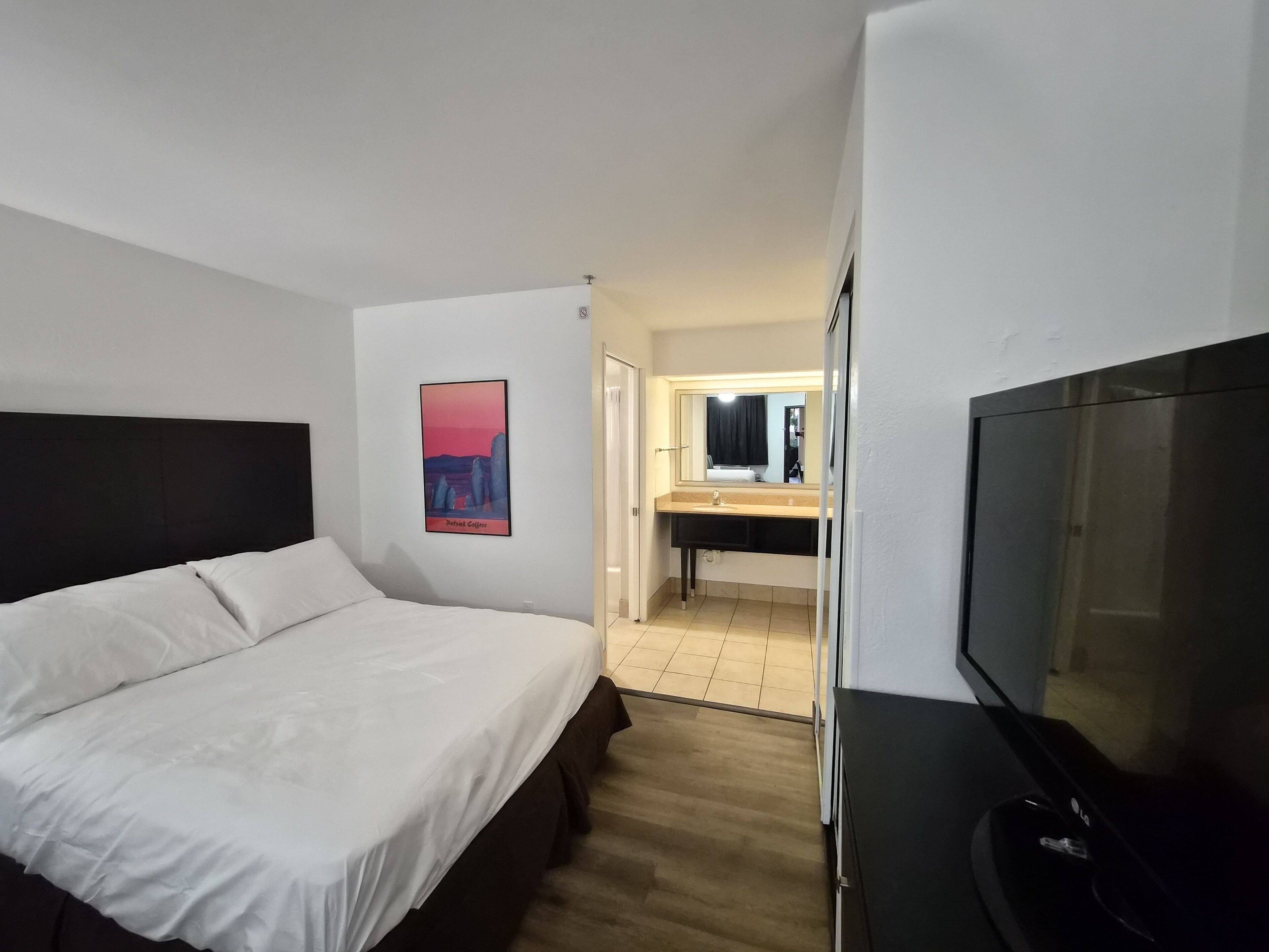 Desk, laptop workspace, blackout curtains, free WiFi