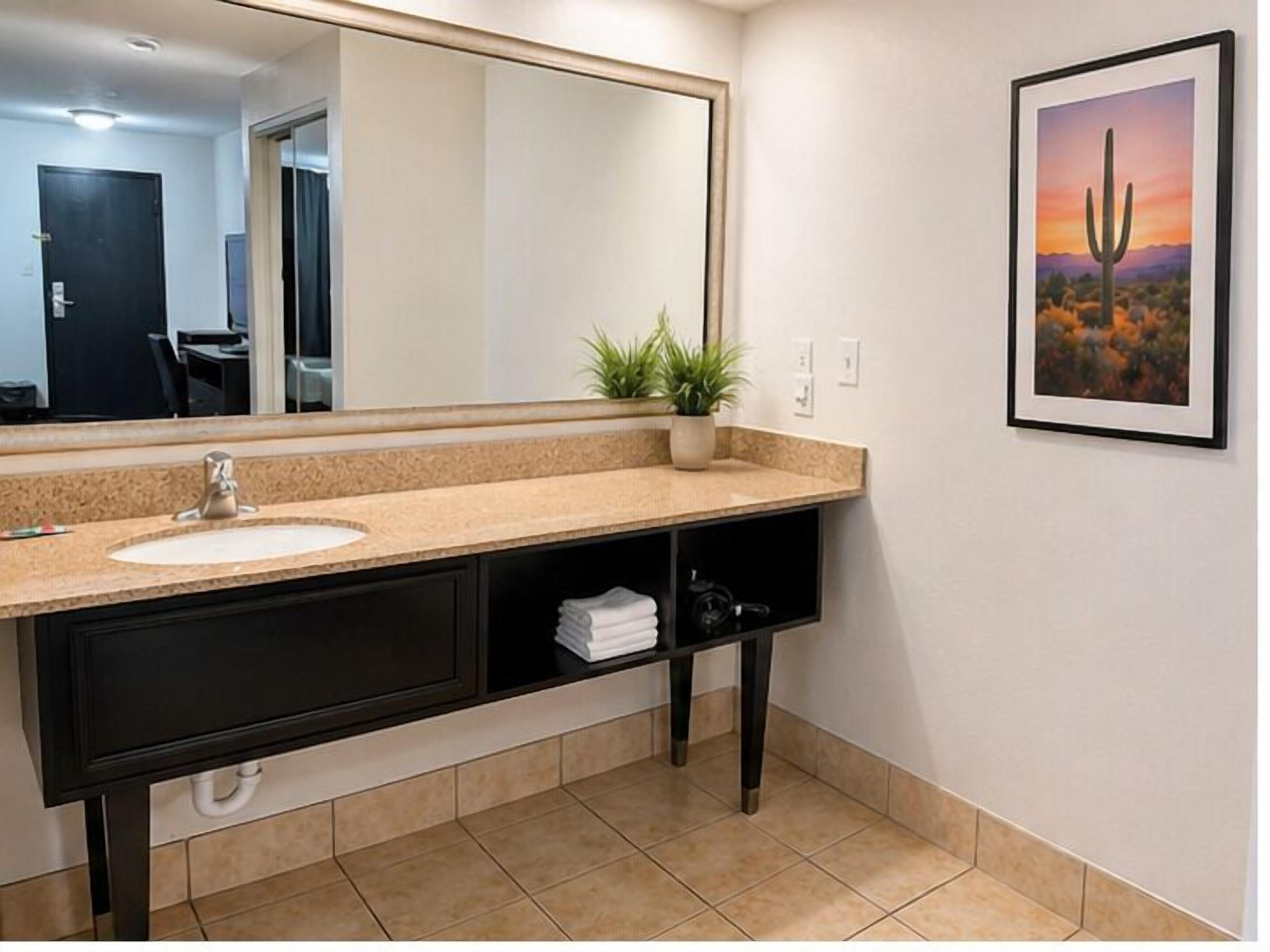 Standard Room, 2 Queen Beds, Pool View | Bathroom | Hair dryer, towels, soap, shampoo