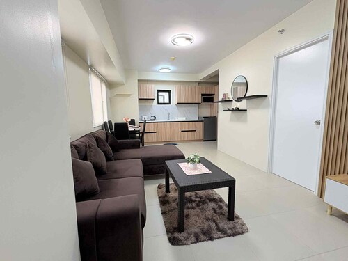 Cozy 1-bedroom 54.5 sqm apartment with AC in lovely Tagaytay City with balcony
