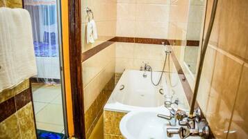 Deluxe Double Room | Bathroom | Shower, slippers, towels, soap