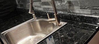 Quiet ground floor 2 bedroom~where you and your pets can unwind in private.